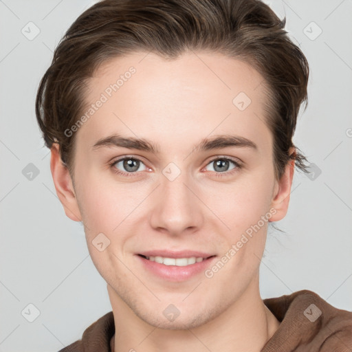 Joyful white young-adult female with short  brown hair and grey eyes