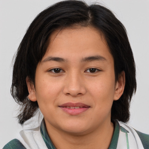 Joyful asian young-adult female with medium  brown hair and brown eyes