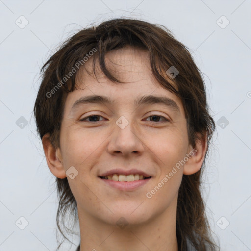 Joyful white young-adult male with medium  brown hair and brown eyes