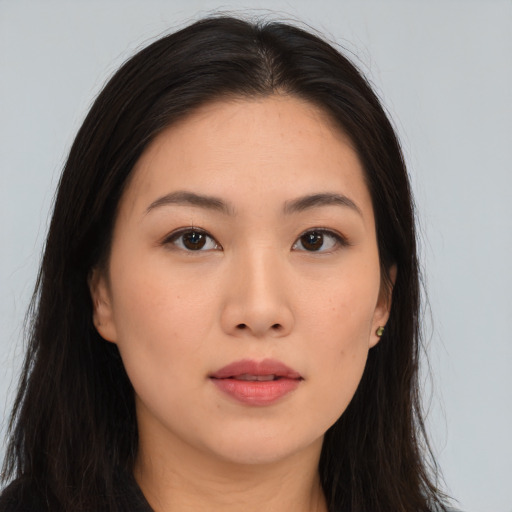 Neutral asian young-adult female with long  brown hair and brown eyes