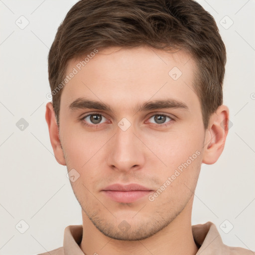 Neutral white young-adult male with short  brown hair and brown eyes