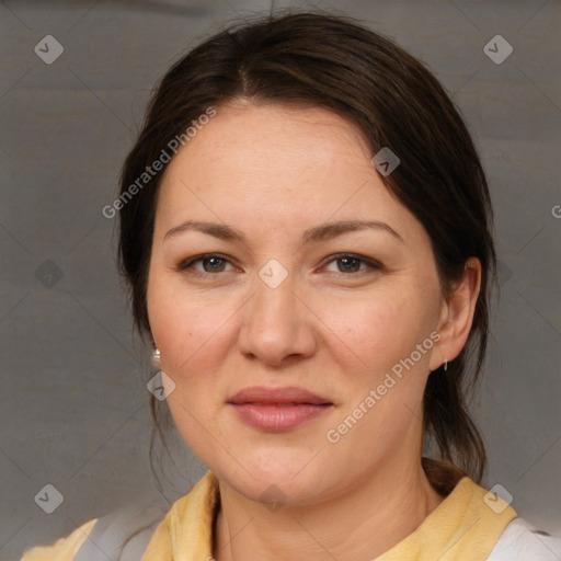 Joyful white adult female with medium  brown hair and brown eyes