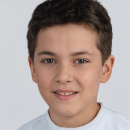 Joyful white child male with short  brown hair and brown eyes