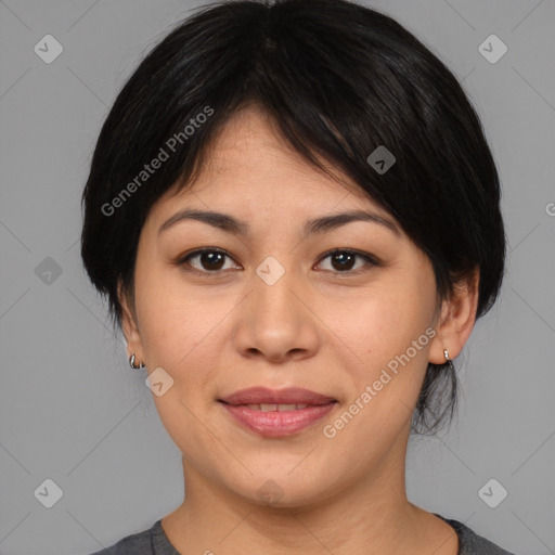 Joyful asian young-adult female with medium  brown hair and brown eyes