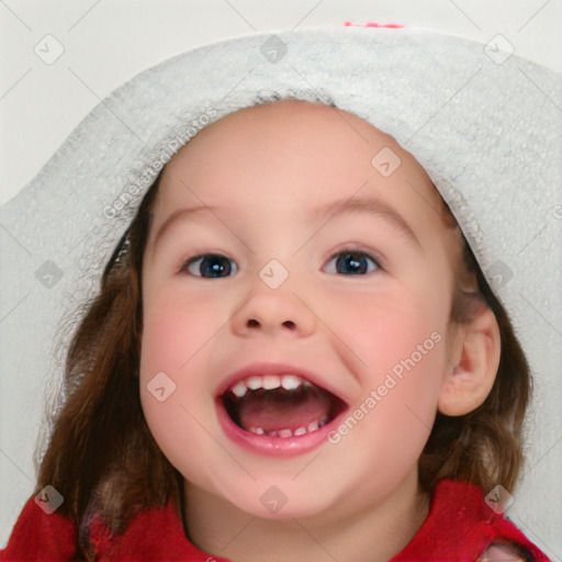 Joyful white child female with medium  brown hair and blue eyes