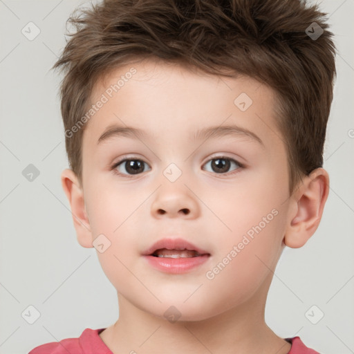 Joyful white child male with short  brown hair and brown eyes