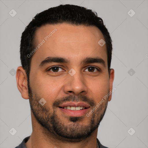 Joyful white young-adult male with short  black hair and brown eyes