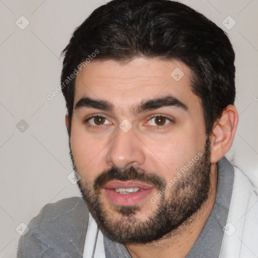 Joyful white young-adult male with short  black hair and brown eyes