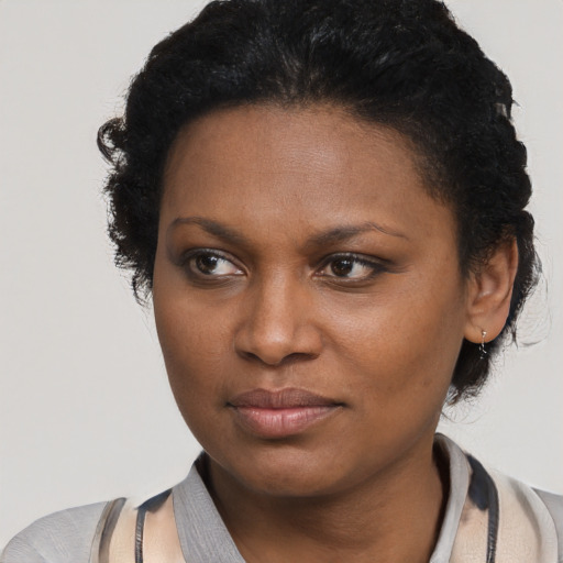 Neutral black young-adult female with short  brown hair and brown eyes
