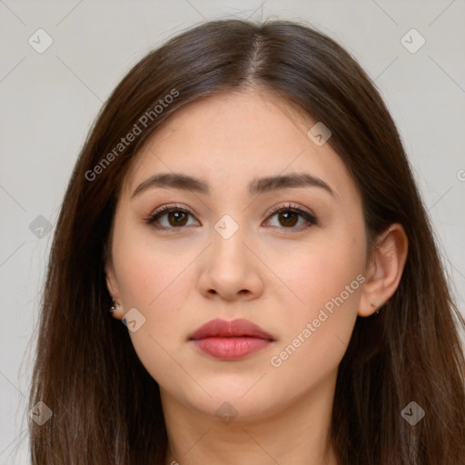 Neutral white young-adult female with long  brown hair and brown eyes