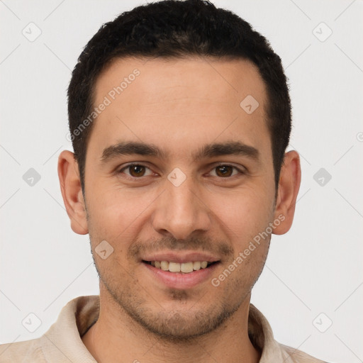 Joyful white young-adult male with short  brown hair and brown eyes