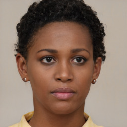 Neutral black young-adult female with short  brown hair and brown eyes