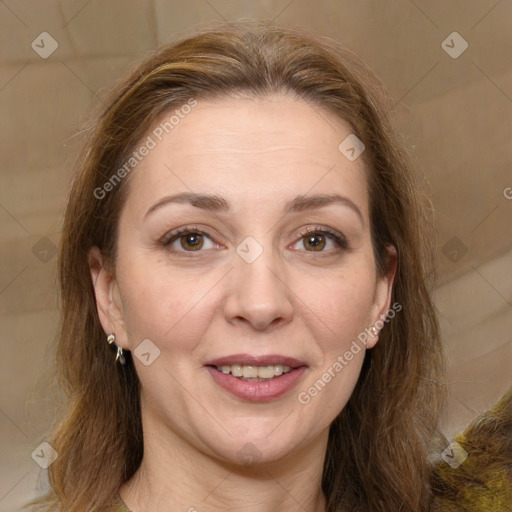 Joyful white adult female with long  brown hair and brown eyes