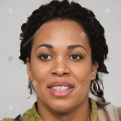 Joyful black adult female with short  brown hair and brown eyes