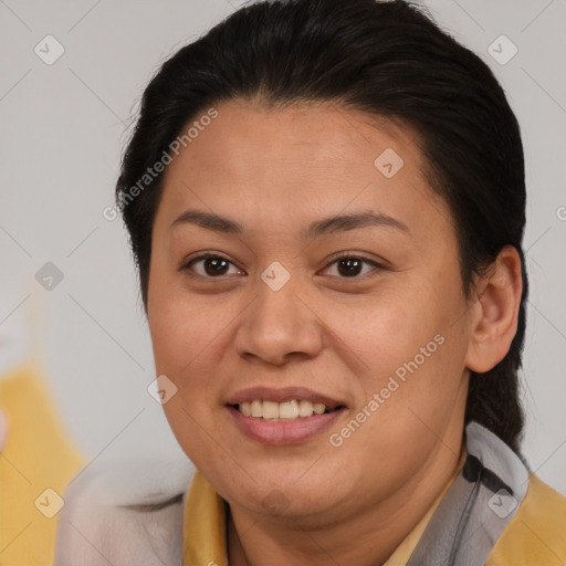 Joyful white adult female with short  brown hair and brown eyes