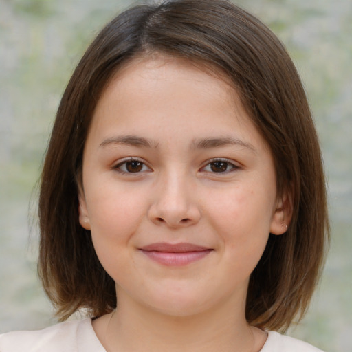 Joyful white child female with medium  brown hair and brown eyes
