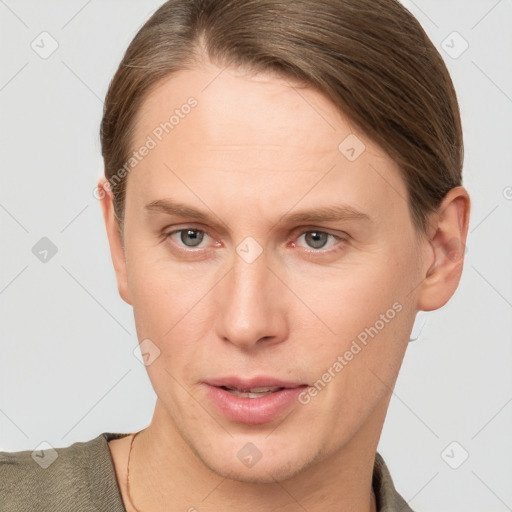 Joyful white young-adult female with short  brown hair and grey eyes