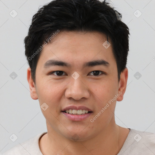 Joyful asian young-adult male with short  brown hair and brown eyes