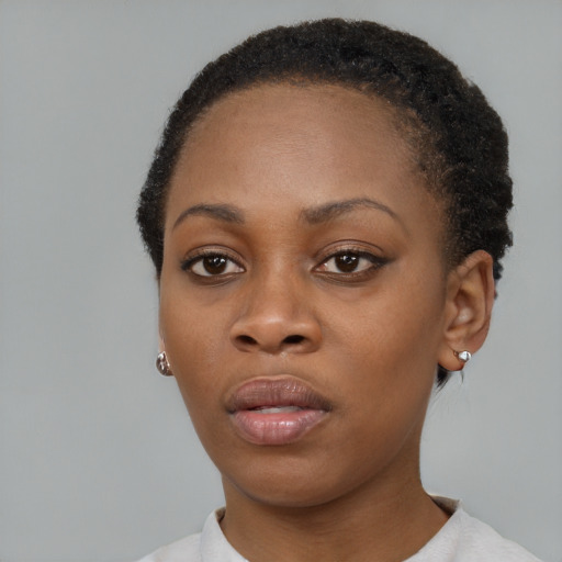 Neutral black young-adult female with short  brown hair and brown eyes