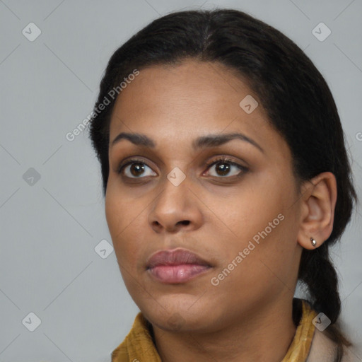 Neutral black young-adult female with long  brown hair and brown eyes