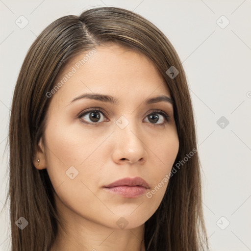 Neutral white young-adult female with long  brown hair and brown eyes