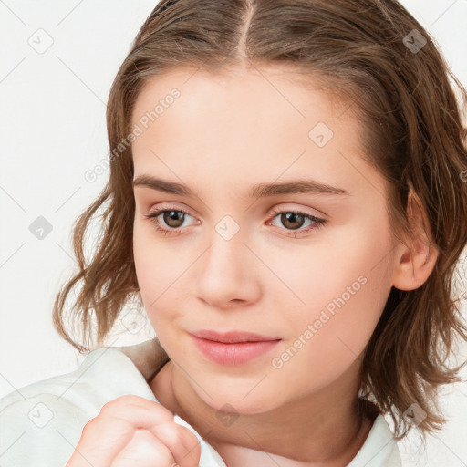 Joyful white child female with medium  brown hair and brown eyes