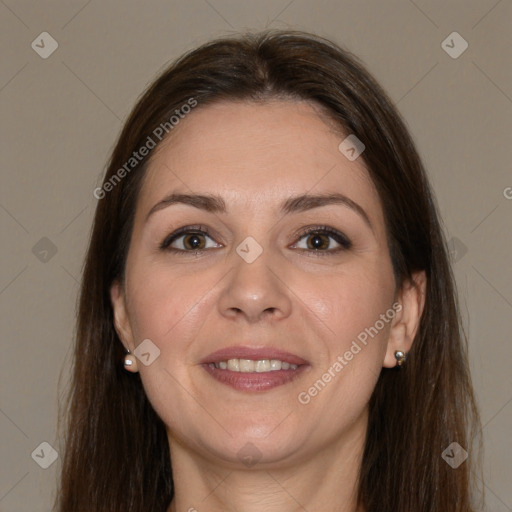 Joyful white adult female with medium  brown hair and brown eyes