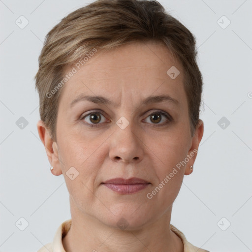 Joyful white adult female with short  brown hair and grey eyes