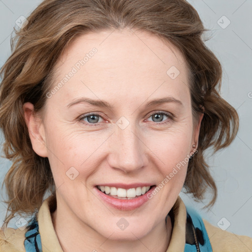 Joyful white young-adult female with medium  brown hair and blue eyes