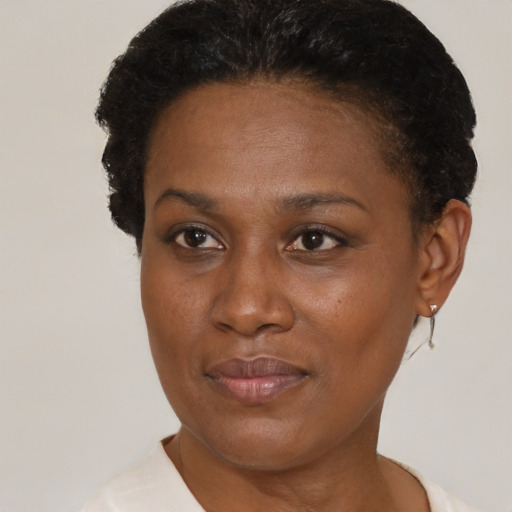 Neutral black adult female with short  brown hair and brown eyes