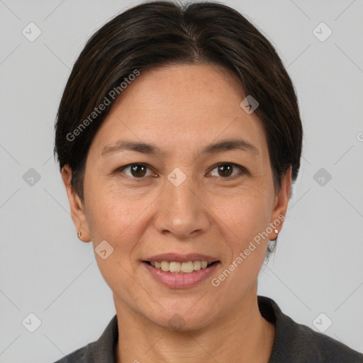 Joyful white adult female with medium  brown hair and brown eyes