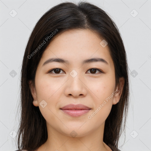 Joyful asian young-adult female with long  brown hair and brown eyes