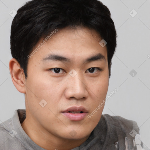Neutral asian young-adult male with short  brown hair and brown eyes