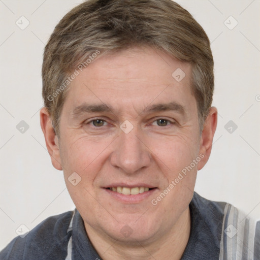 Joyful white adult male with short  brown hair and grey eyes