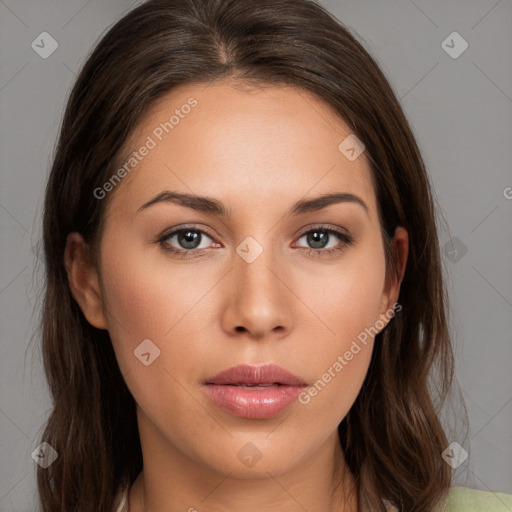 Neutral white young-adult female with long  brown hair and brown eyes