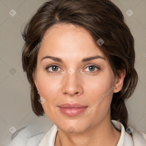 Joyful white young-adult female with medium  brown hair and green eyes