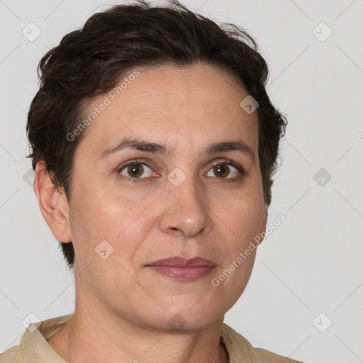 Joyful white adult female with short  brown hair and brown eyes