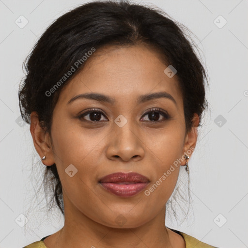 Joyful latino young-adult female with medium  brown hair and brown eyes