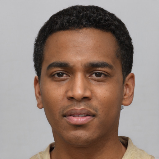 Neutral black young-adult male with short  black hair and brown eyes