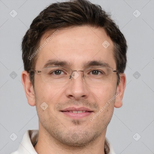 Joyful white adult male with short  brown hair and brown eyes