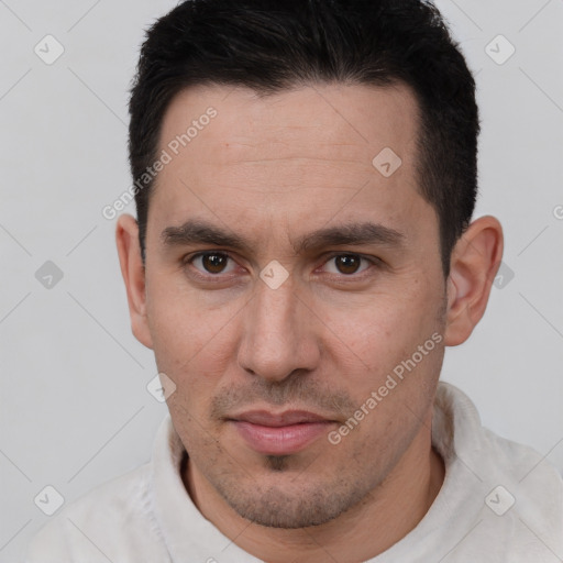 Joyful white young-adult male with short  brown hair and brown eyes