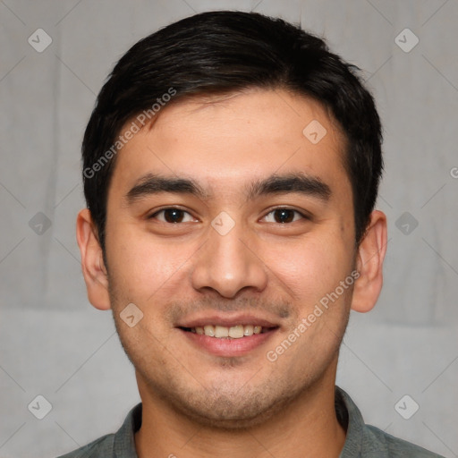 Joyful white young-adult male with short  black hair and brown eyes