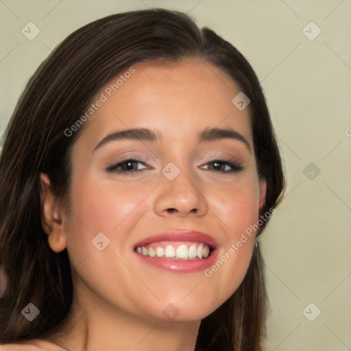 Joyful white young-adult female with long  black hair and brown eyes