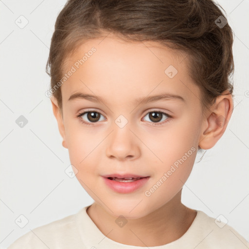 Joyful white child female with short  brown hair and brown eyes