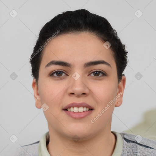 Joyful asian young-adult female with short  black hair and brown eyes