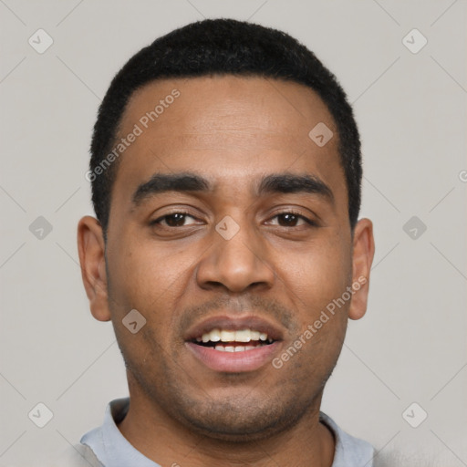 Joyful black young-adult male with short  black hair and brown eyes