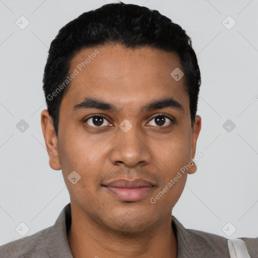 Joyful latino young-adult male with short  black hair and brown eyes