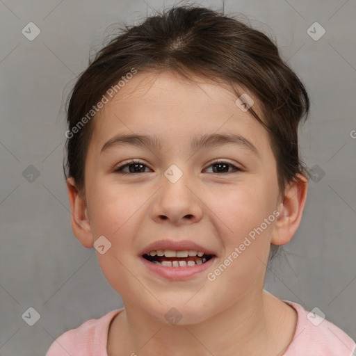 Joyful white child female with short  brown hair and brown eyes