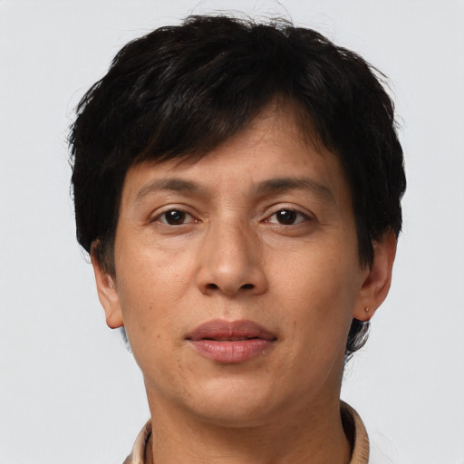 Joyful asian adult female with short  brown hair and brown eyes