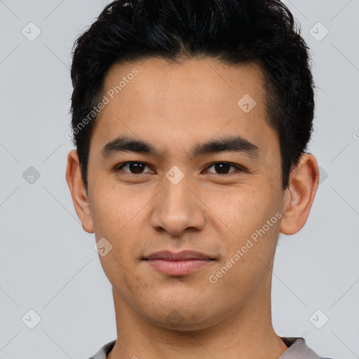 Neutral latino young-adult male with short  black hair and brown eyes